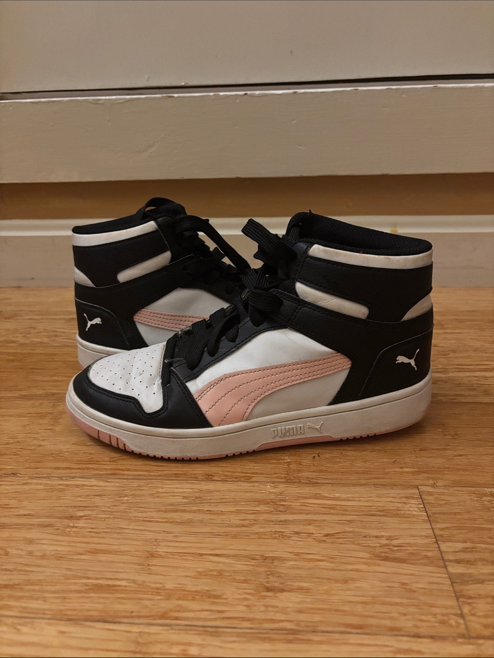Puma women’s High-Top Sneakers in Black, White & Pink